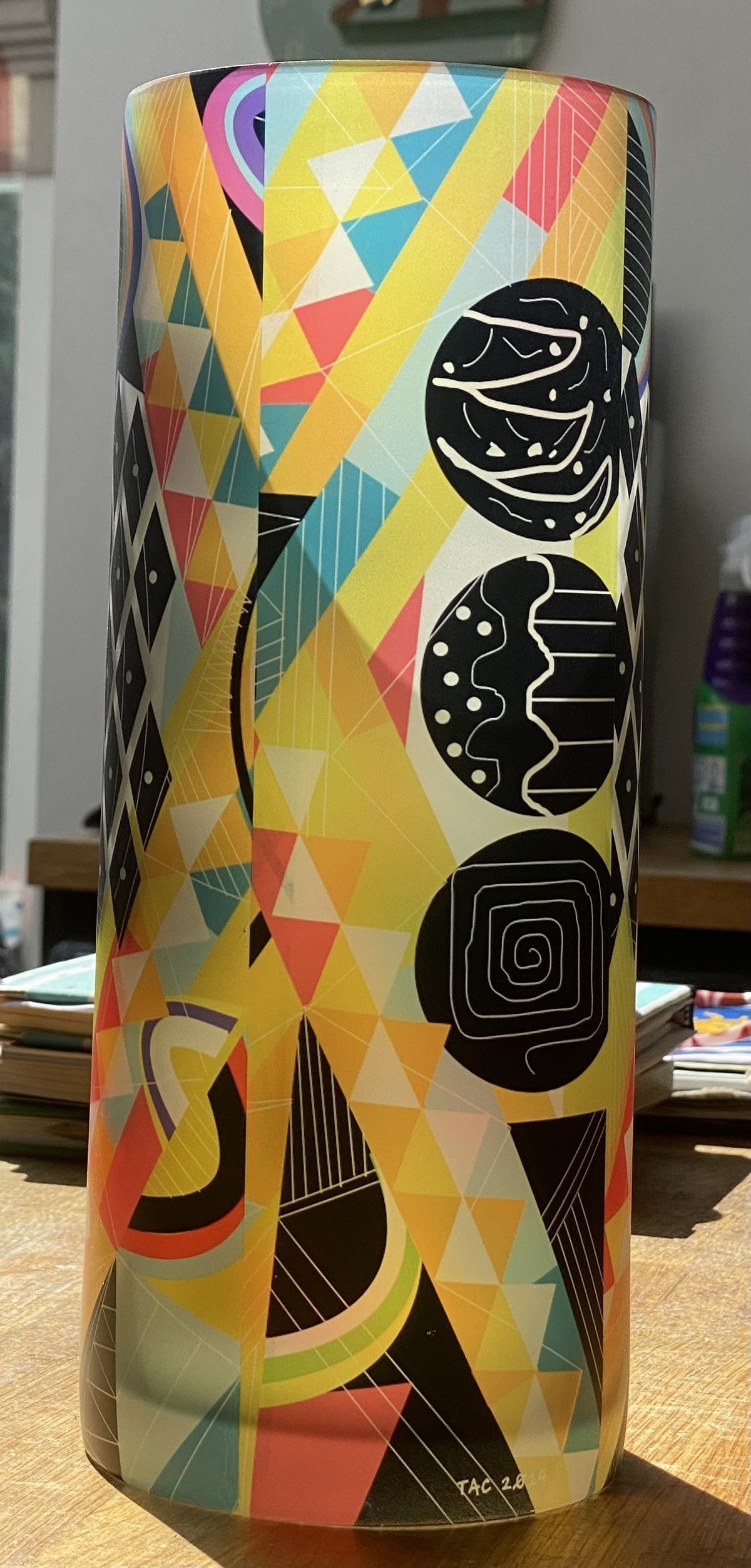 Tall Cylindrical Glass Vase with a Vibrant Abstract Design
